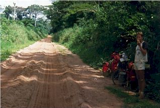 Sandy dirt road in the rainforest of the Democratic Republic of Congo